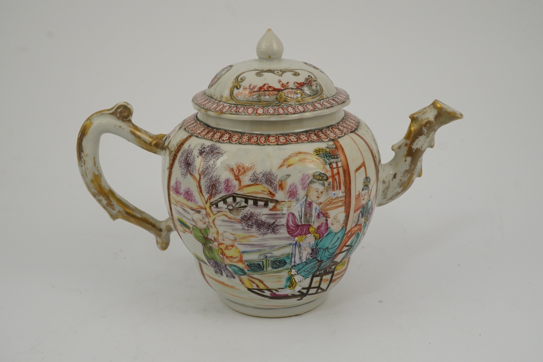 A Chinese famille rose ‘mandarin’ ogee shaped teapot, Qianlong period
